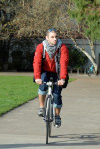 Cyclist using BackTpack from the front