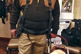 Ed wearing BackTpack with Alepo his service dog