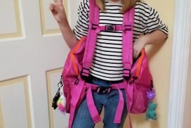 Ten year old girl happy with pink BackTpack 3.1